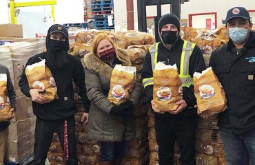 Sticking Labels on Potato Bags Means Saving the Day for PEI Volunteers